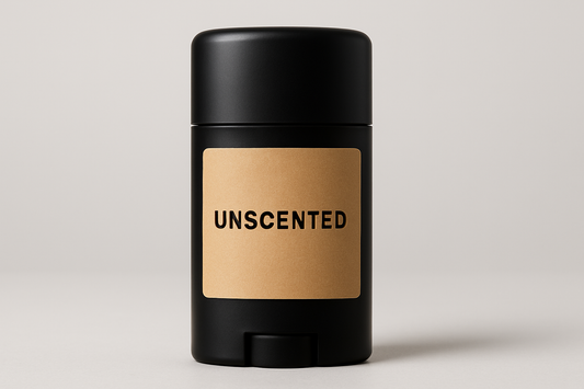 circular stick deodorant container, black matte, with tan label that says "Unscented", made with grass fed tallow